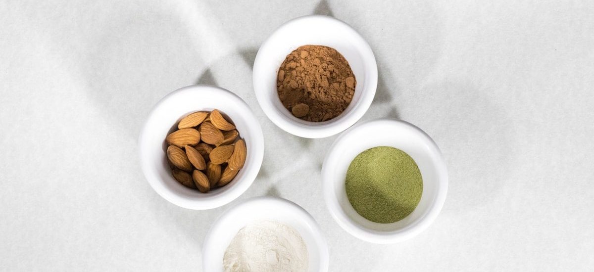 brown and white round food on white ceramic bowls